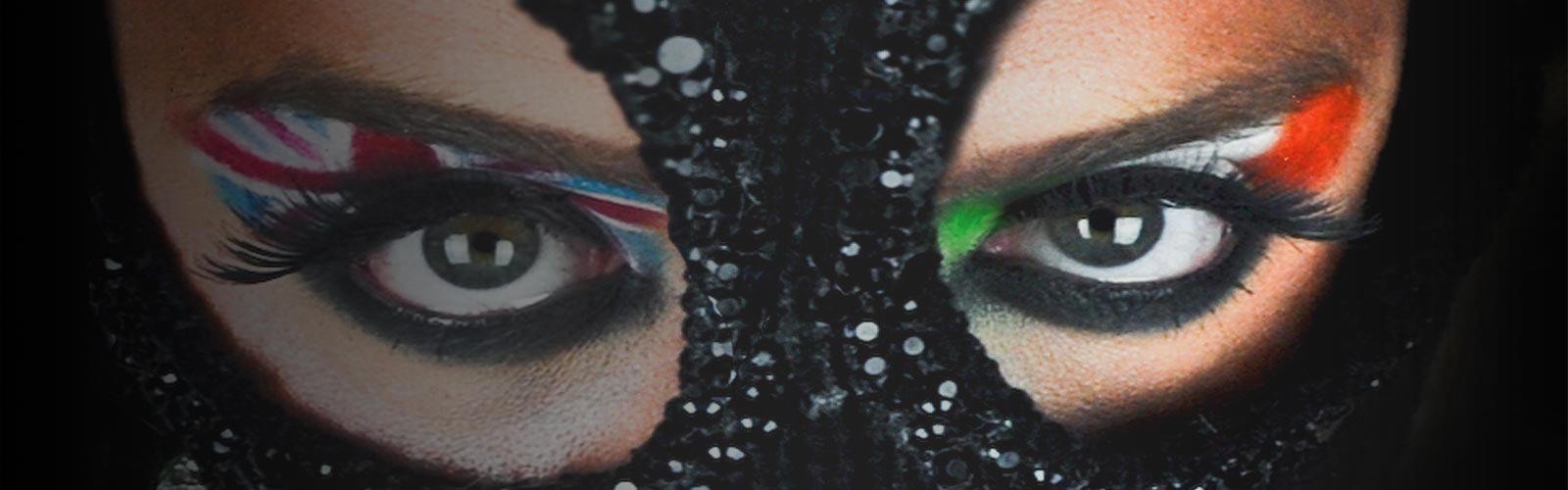 Close up image of a person wearing a balaclava with eye makeup of the United Kingdom and Ireland flags
